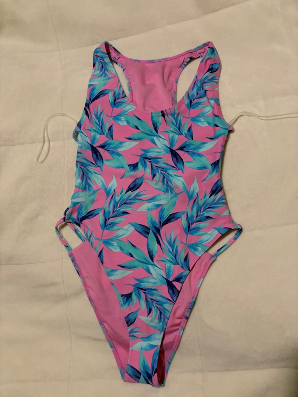 Pink One-Piece Swimsuit with Teal Leaf Print and Caged Back